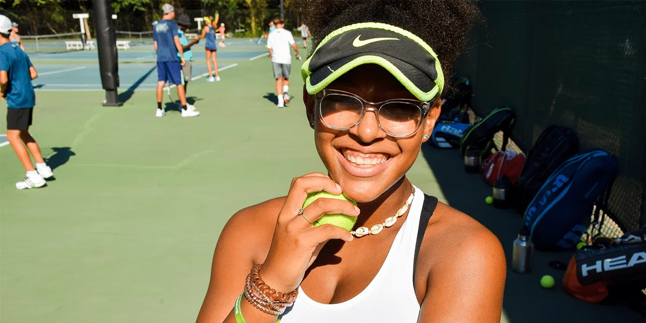 UTA (Universal Tennis Academy) Blackburn Junior Holding Tennis Ball