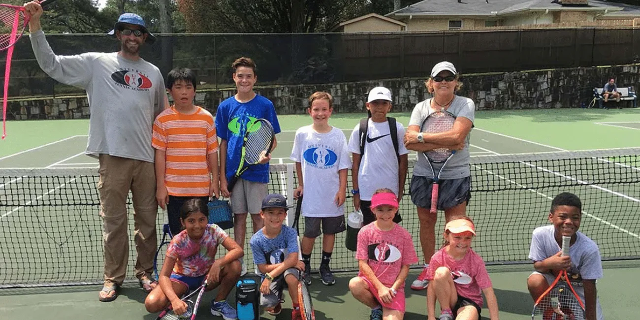 UTA (Universal Tennis Academy) Briarlake Summer Mixed Group on Court