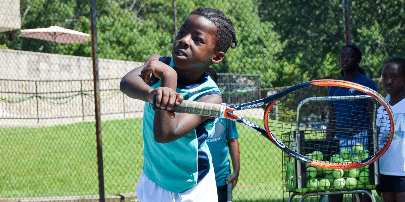 UTA (Universal Tennis Academy) McGhee Summer Camp Young Boy With Racket