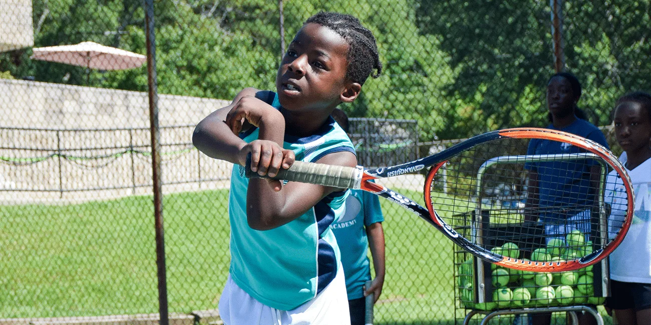 UTA (Universal Tennis Academy) McGhee Summer Camp Young Boy With Racket