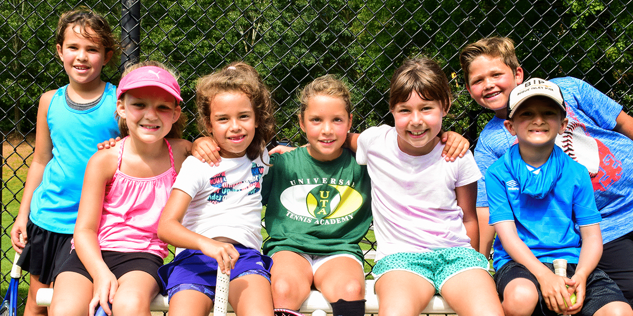 UTA (Universal Tennis Academy) Chastain Park Summer Camp Kids on Bench