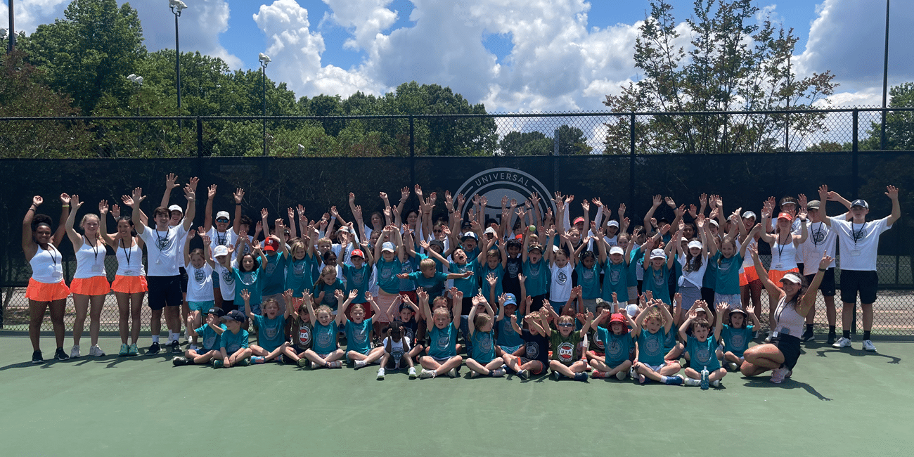 Group photo of all Blackburn tennis camp attendees